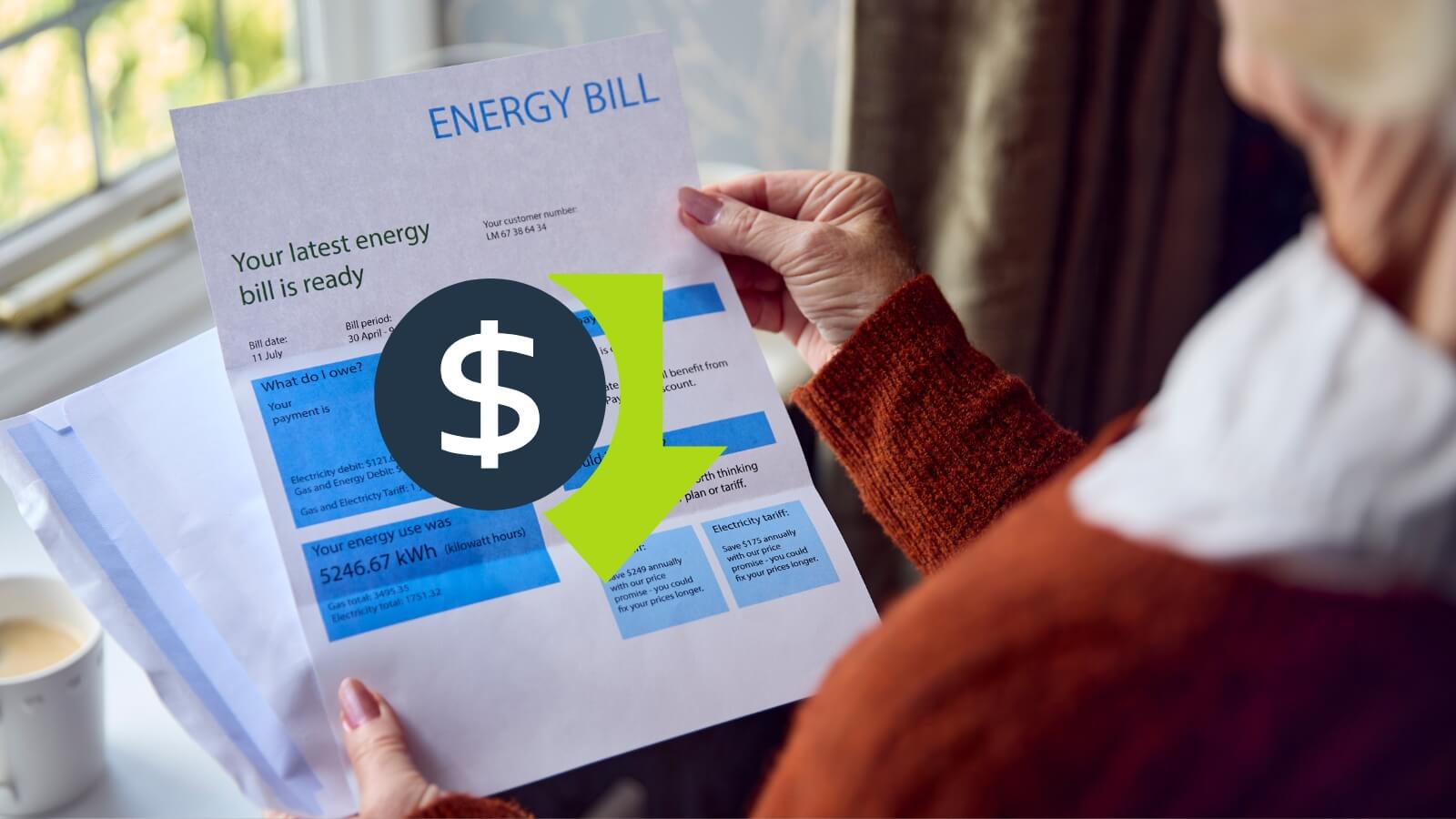 Woman looking at lowered energy bill