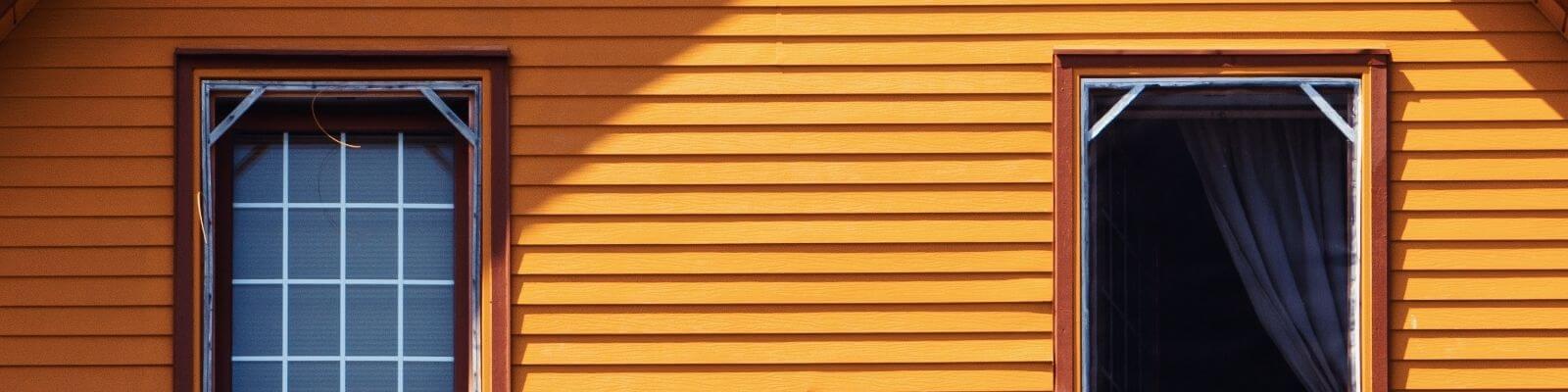 Hardie Board Siding on yellow house