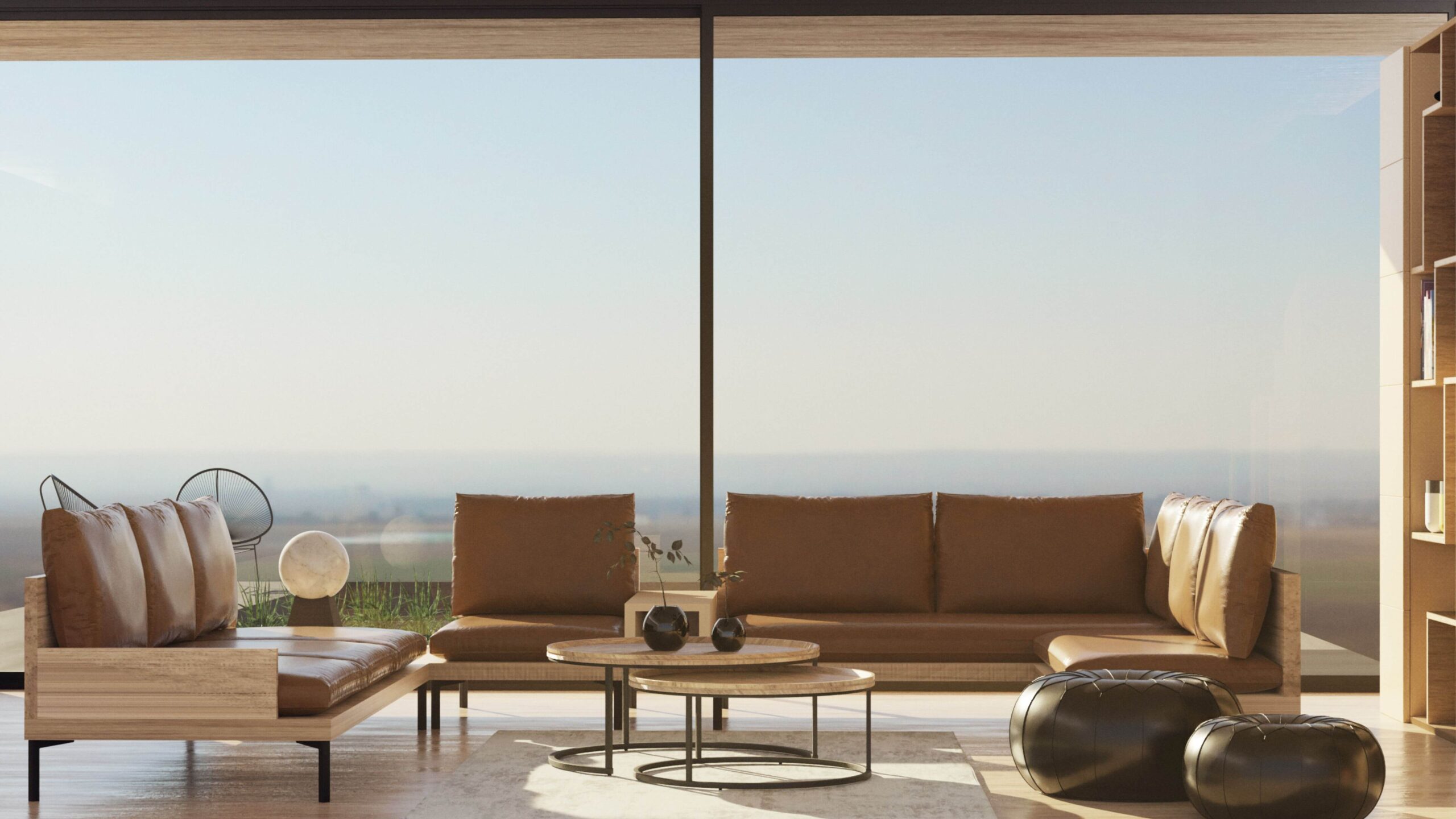 living room with a big brown couch in front of a big picture window