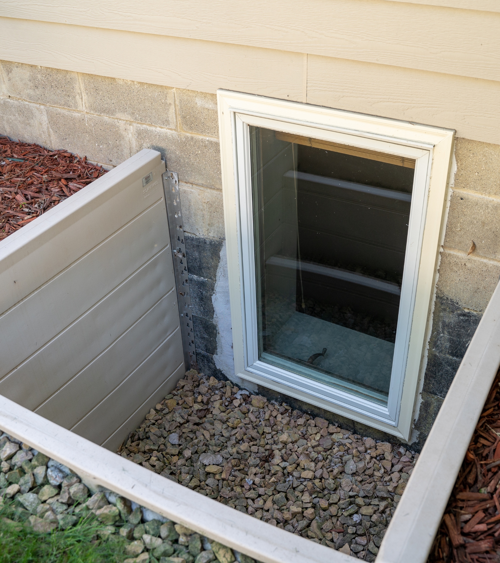 Egress window with stone